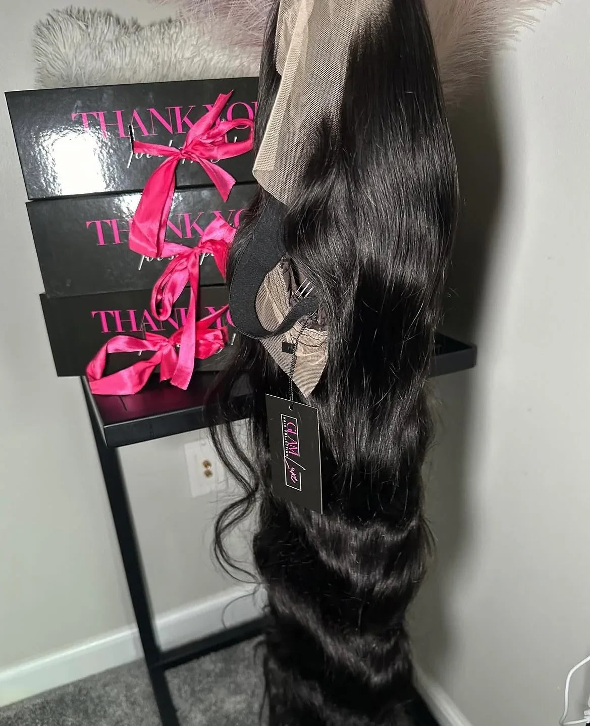 Body Wave Virgin hair extension from Glam Luxe Hair Collection showcasing smooth, wavy hair with natural shine and volume.