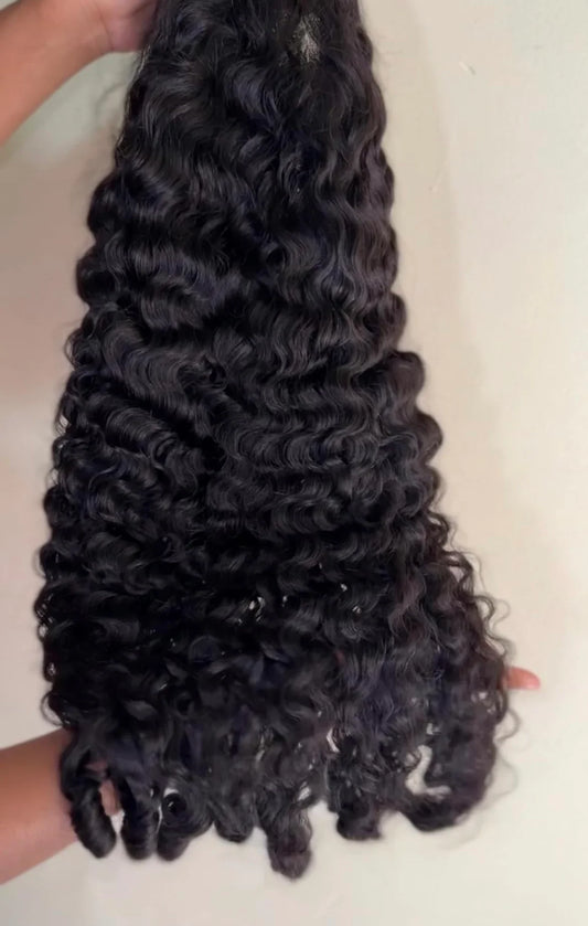 Burmese Curly Virgin Hair Extension by Glam Luxe Hair Collection, showcasing soft, voluminous curly hair strands.