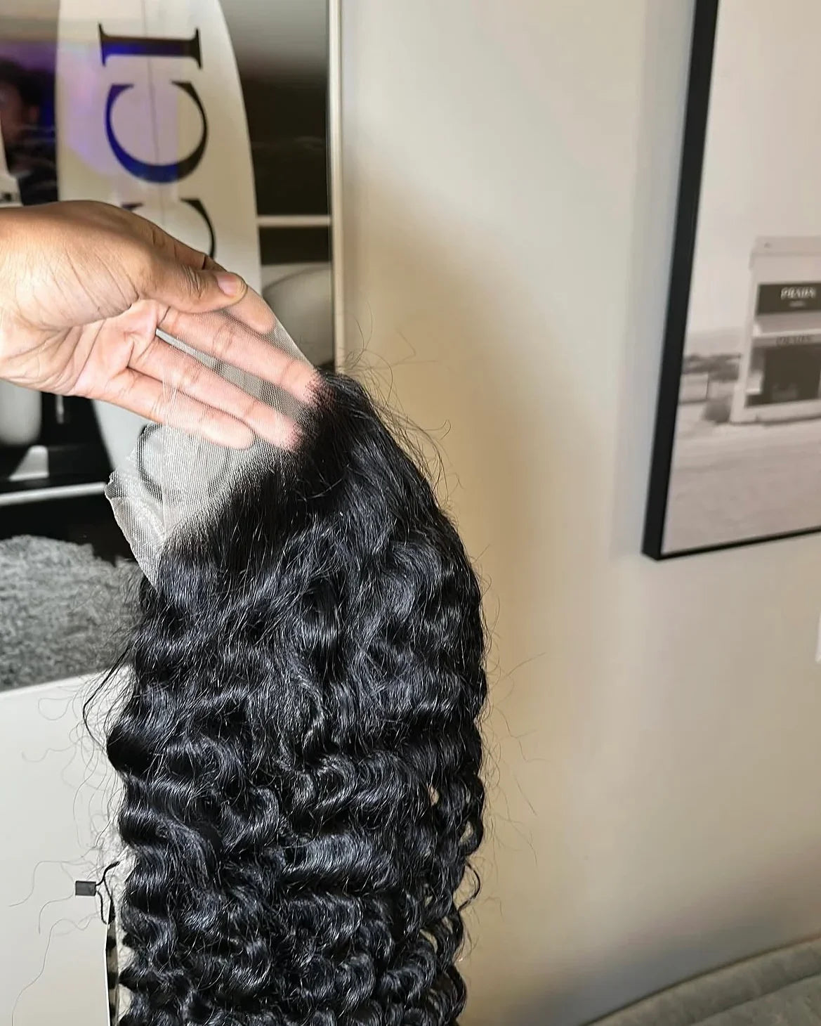 Full-length deep wave Virgin hair extension from Glam Luxe Hair Collection showcasing its lush, natural wave pattern and silky texture.