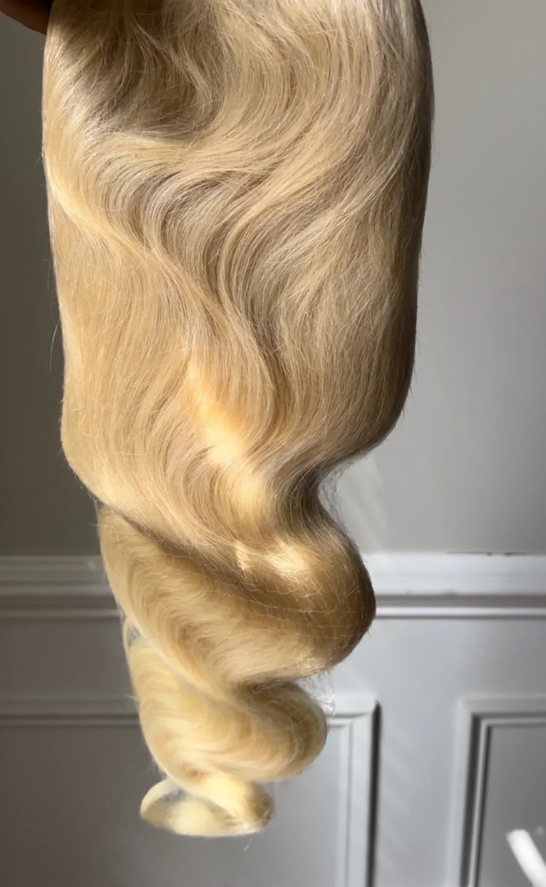 Glam Luxe Hair Collection 613 Body Wave virgin hair bundle with loose, wavy texture highlighted in natural blonde color